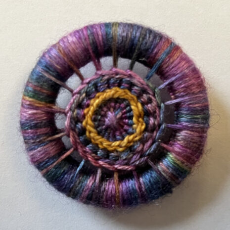 Needle minder Dorset button