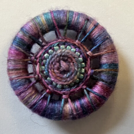 Dorset button needle minder