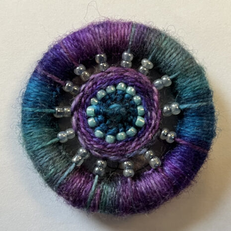 Dorset button needle minder