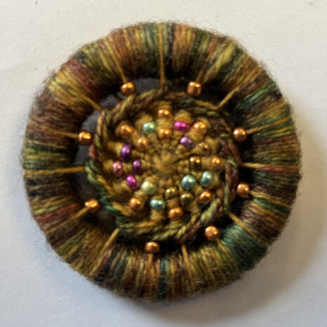 Dorset button needle minder