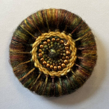 Dorset button needle minder